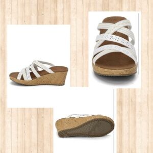 Brand new size 10 white skecher sandals with wedge heel.